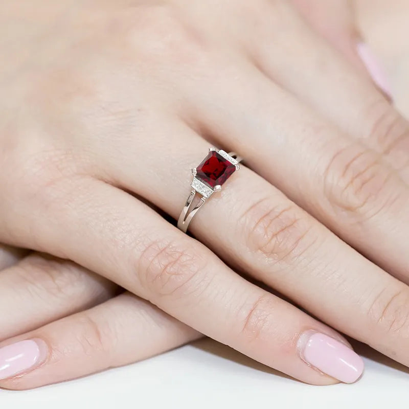 zlatý prsten s 1,30ct granátem a 0,03ct diamanty w0103-gar-01