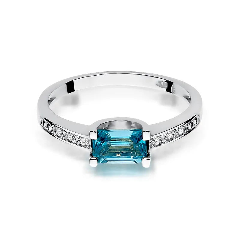 zlatý prsten s topazem 0,65 ct a diamanty 0,03 ct w0105-tob-01