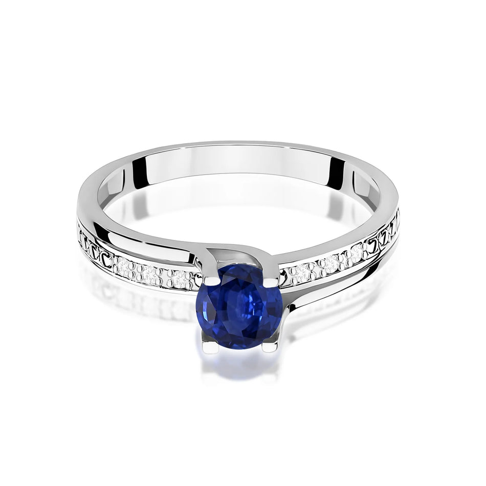 Prsten z bílého zlata s 0,50ct safírem a 0,03ct diamanty