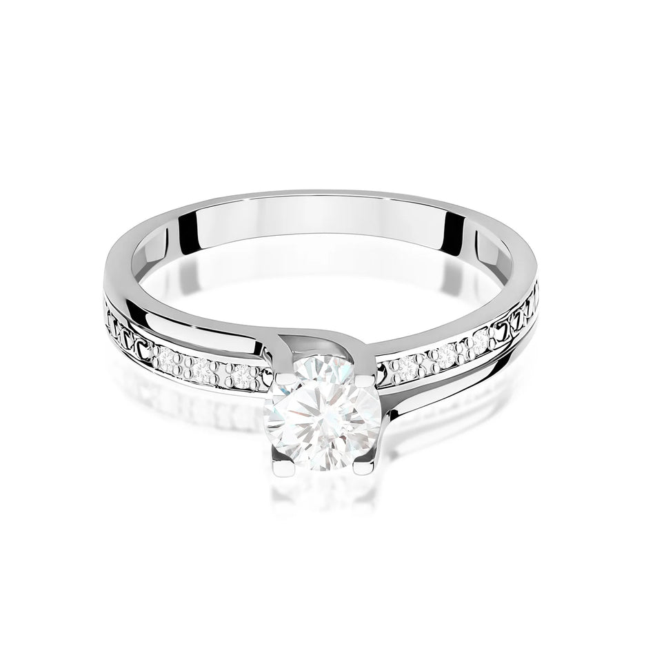 Prsten z bílého zlata s bílým safírem 0,60 ct a diamanty 0,03 ct