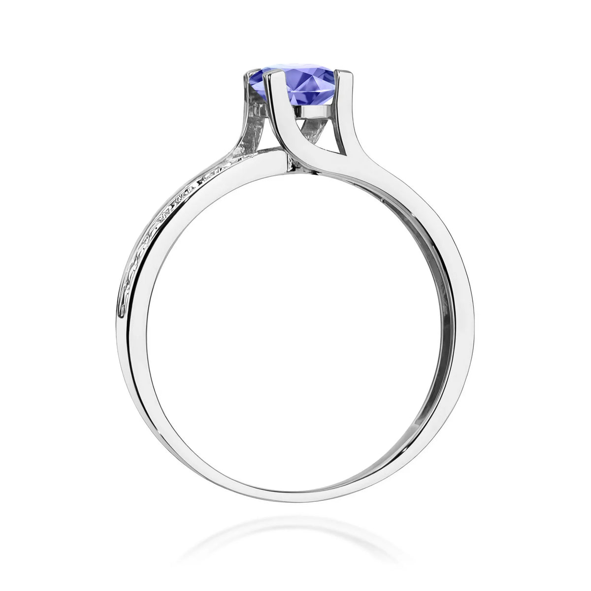 Halo prsten z bílého 14k zlata s kulatým tanzanitem 0,50 ct a diamanty 0,03 ct