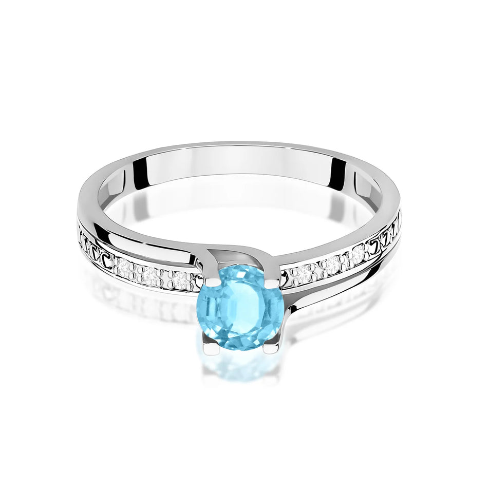 Prsten z bílého zlata s topazem 0,50 ct a diamanty 0,03 ct