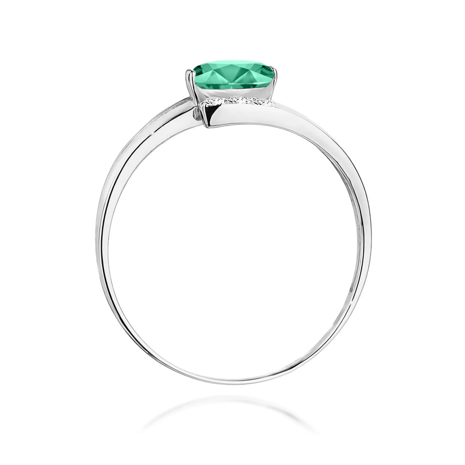 Prsten z bílého zlata se smaragdem 0,40 ct a diamanty 0,052 ct