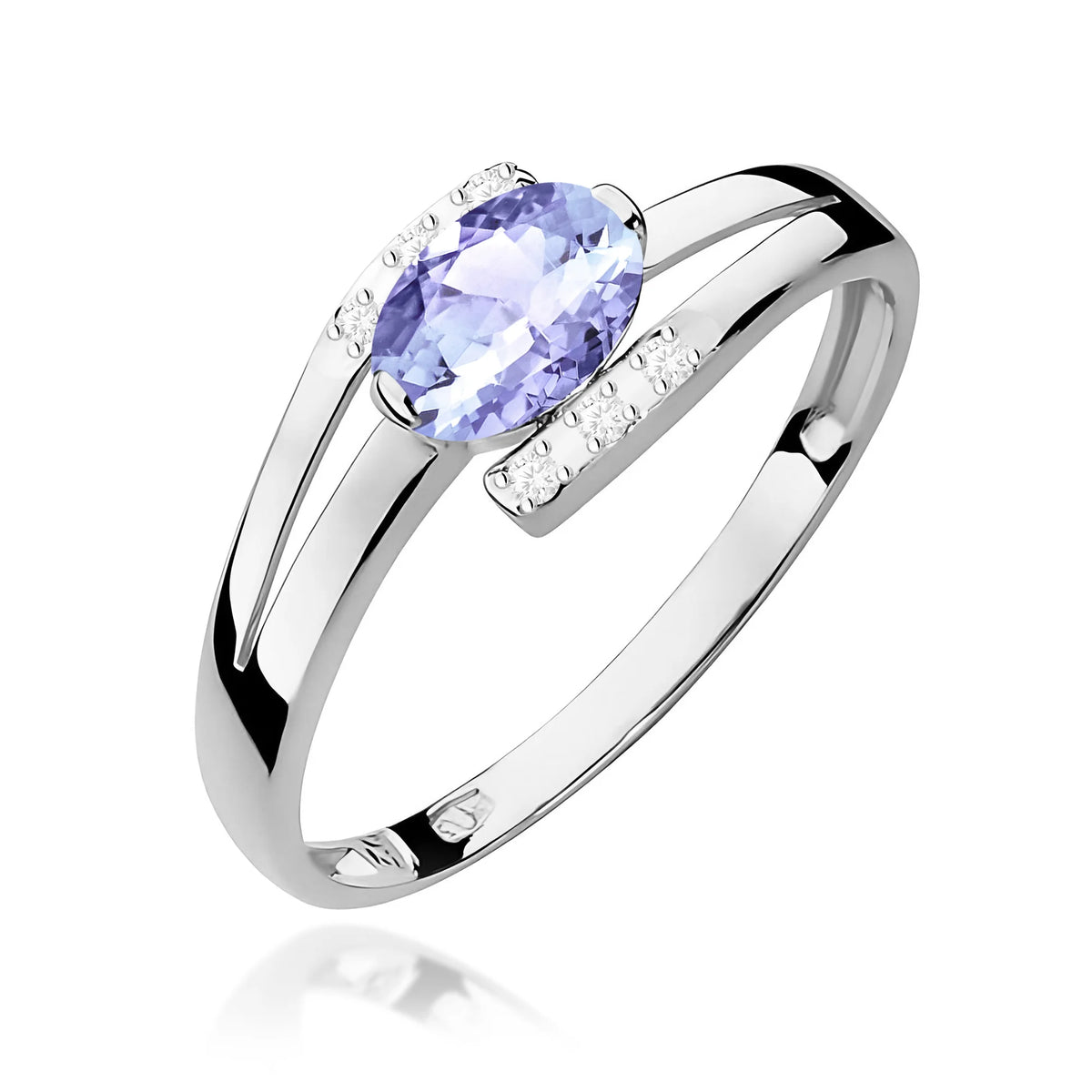 Prsten z bílého 14k zlata s oválným tanzanitem 0,40 ct a diamanty 0,052 ct
