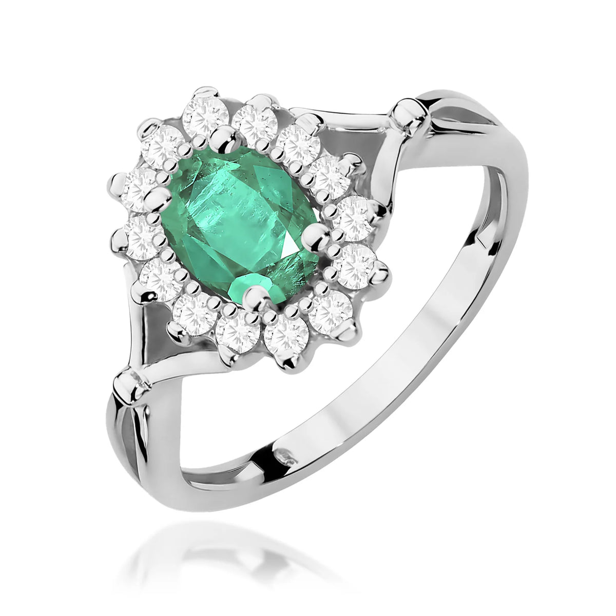 Květinový prsten z bílého 14k zlata s oválným smaragdem 0,80 ct a diamanty 0,28 ct