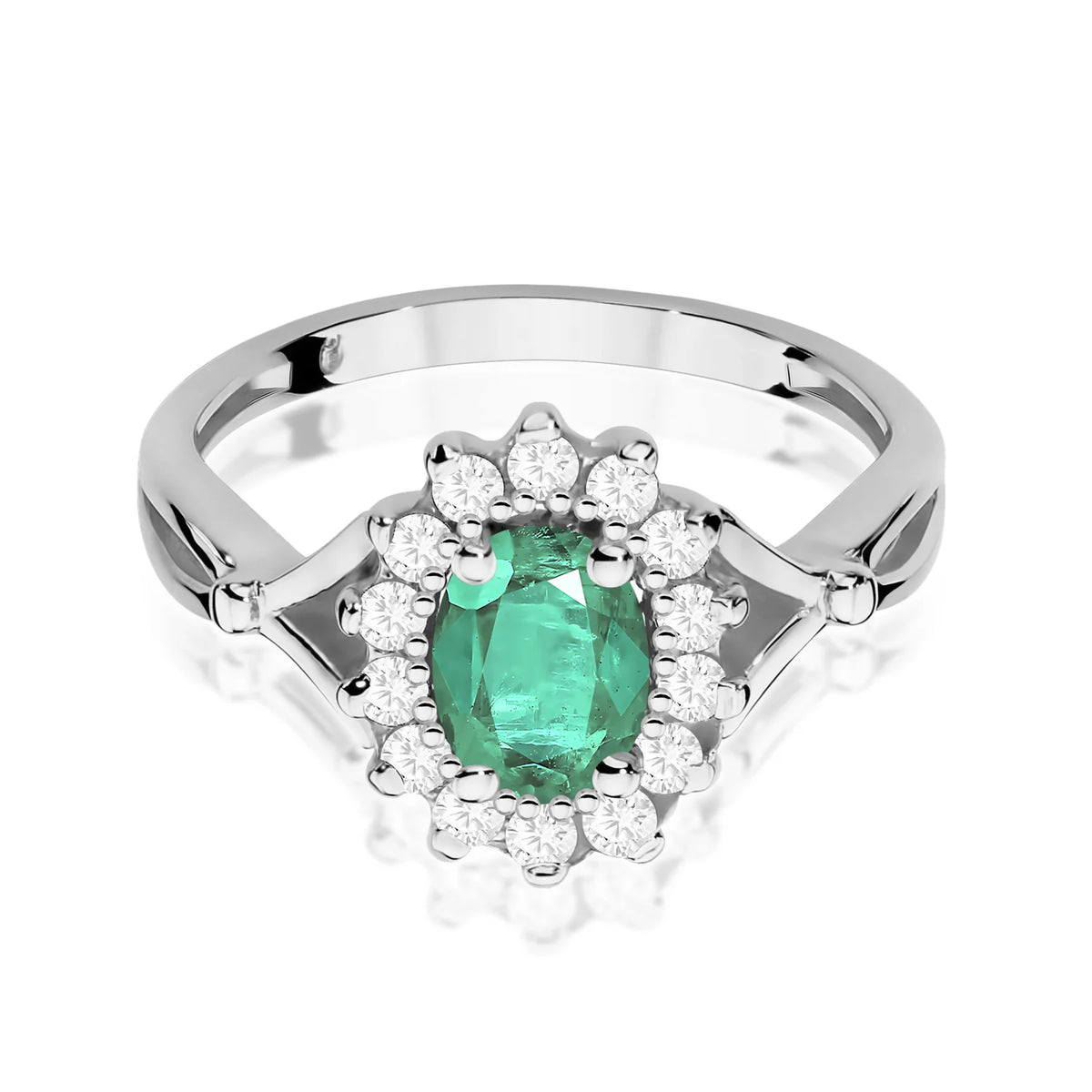Květinový prsten z bílého 14k zlata s oválným smaragdem 0,80 ct a diamanty 0,28 ct
