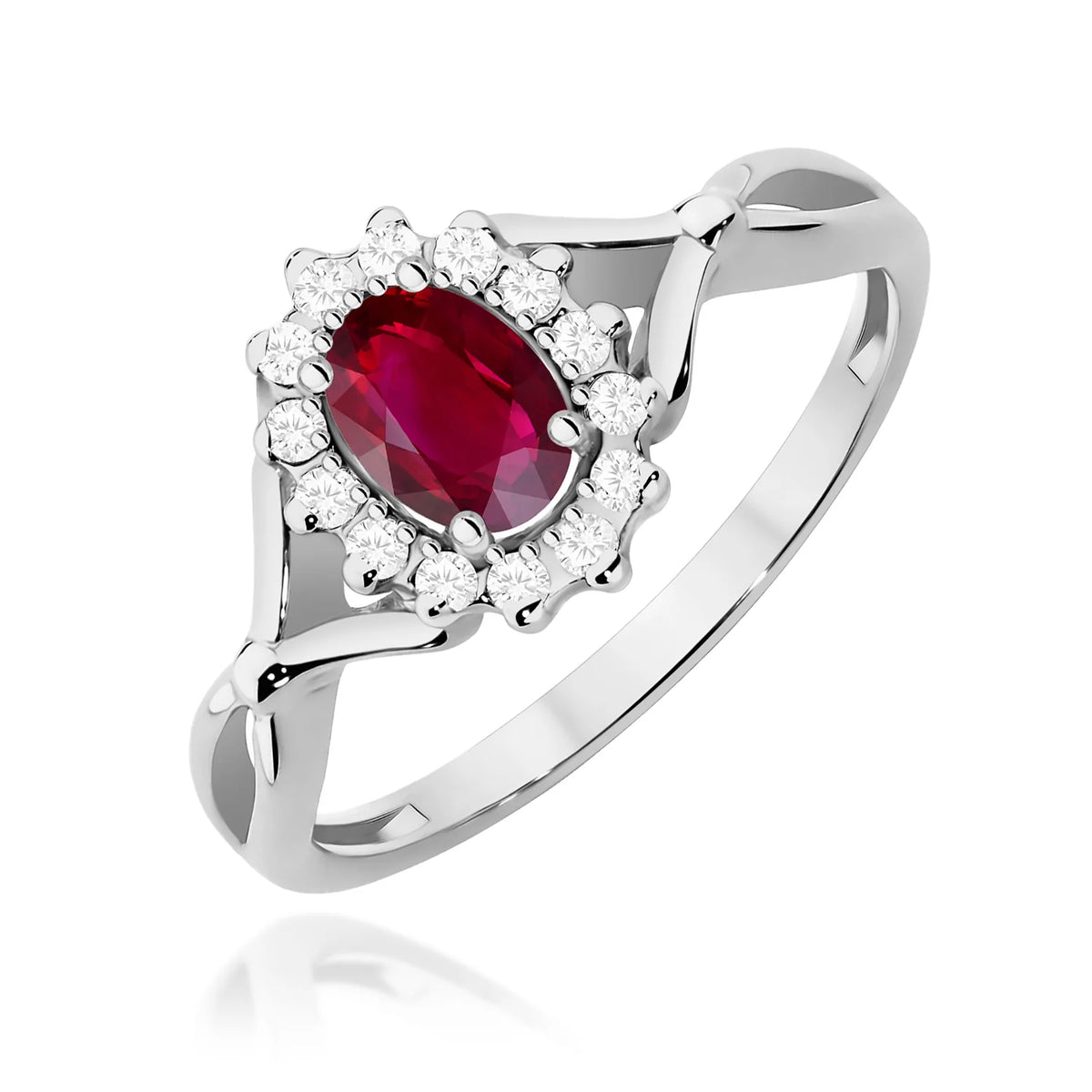 Kruhový prsten z bílého 14k zlata s dělenými rameny s oválným rubínem 0,60 ct a diamanty 0,12 ct
