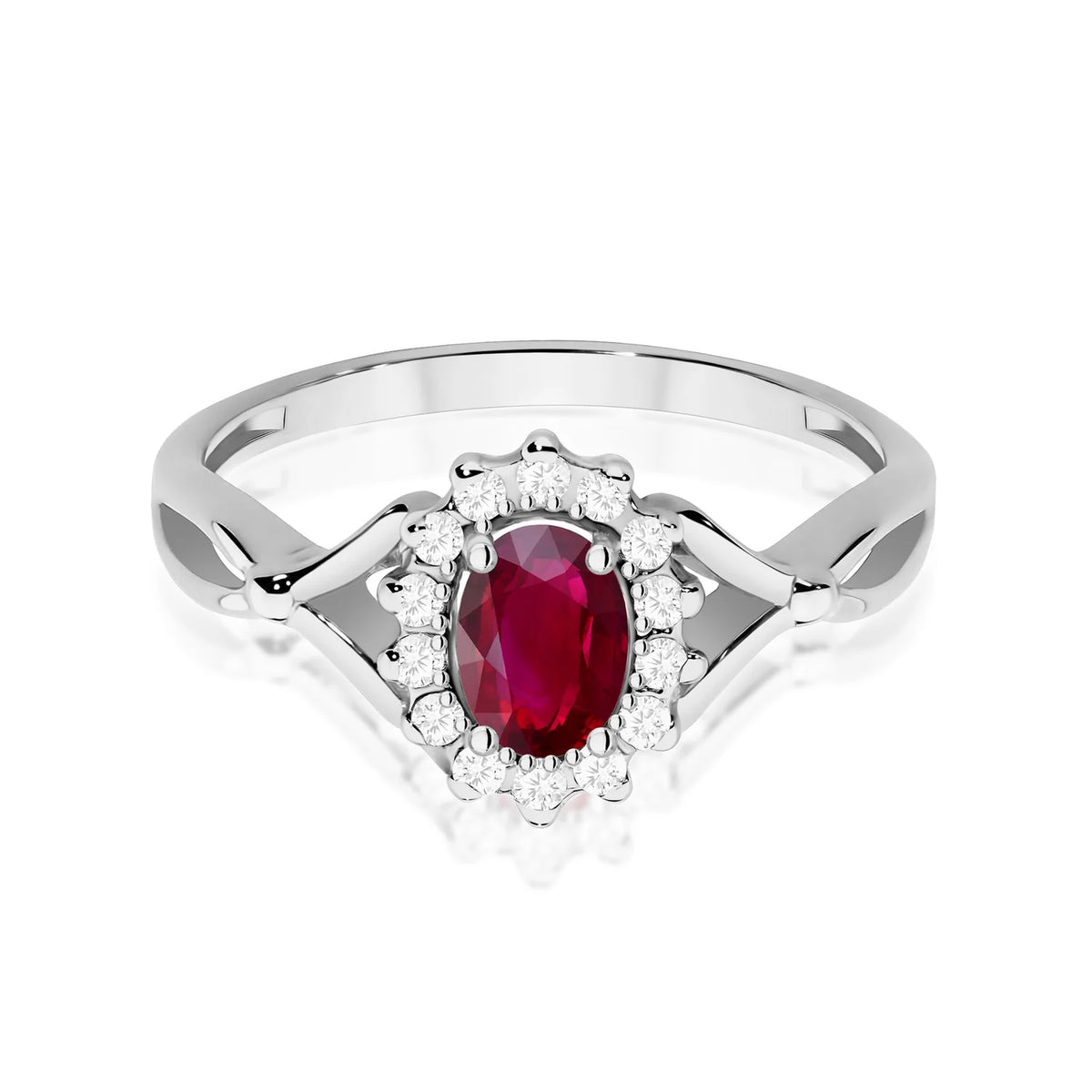 Kruhový prsten z bílého 14k zlata s dělenými rameny s oválným rubínem 0,60 ct a diamanty 0,12 ct