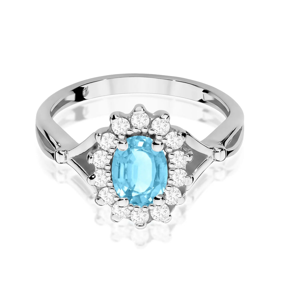 Prsten z bílého zlata s topazem 0,90 ct a diamanty 0,28 ct