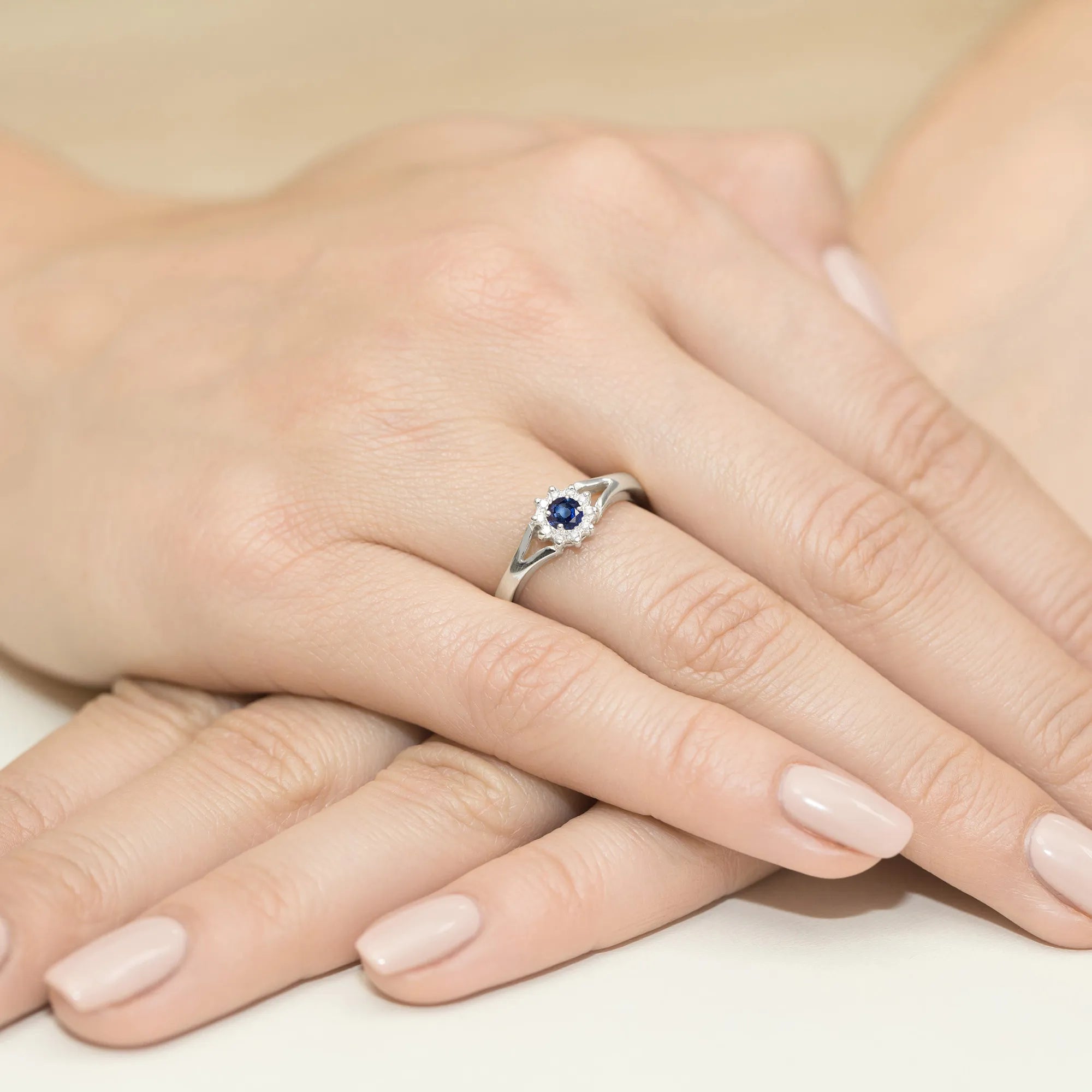 gold-ring-with-0-15ct-sapphire-and-0-086ct-diamonds-w0185-sab-01