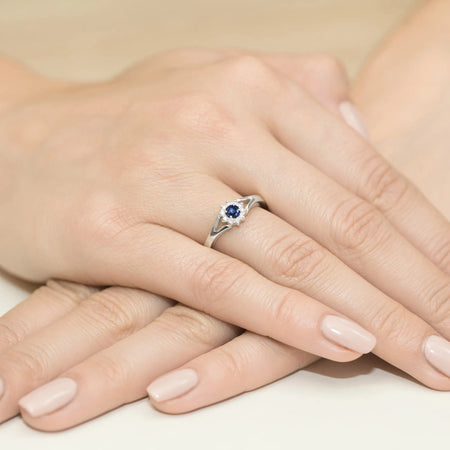 gold-ring-with-0-15ct-sapphire-and-0-086ct-diamonds-w0185-sab-01