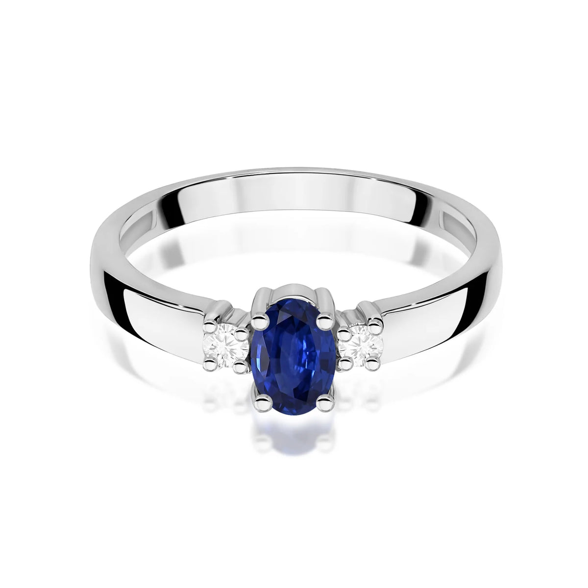 Prsten se třemi kameny z bílého 14k zlata s oválným safírem 0,70 ct a diamanty 0,08 ct