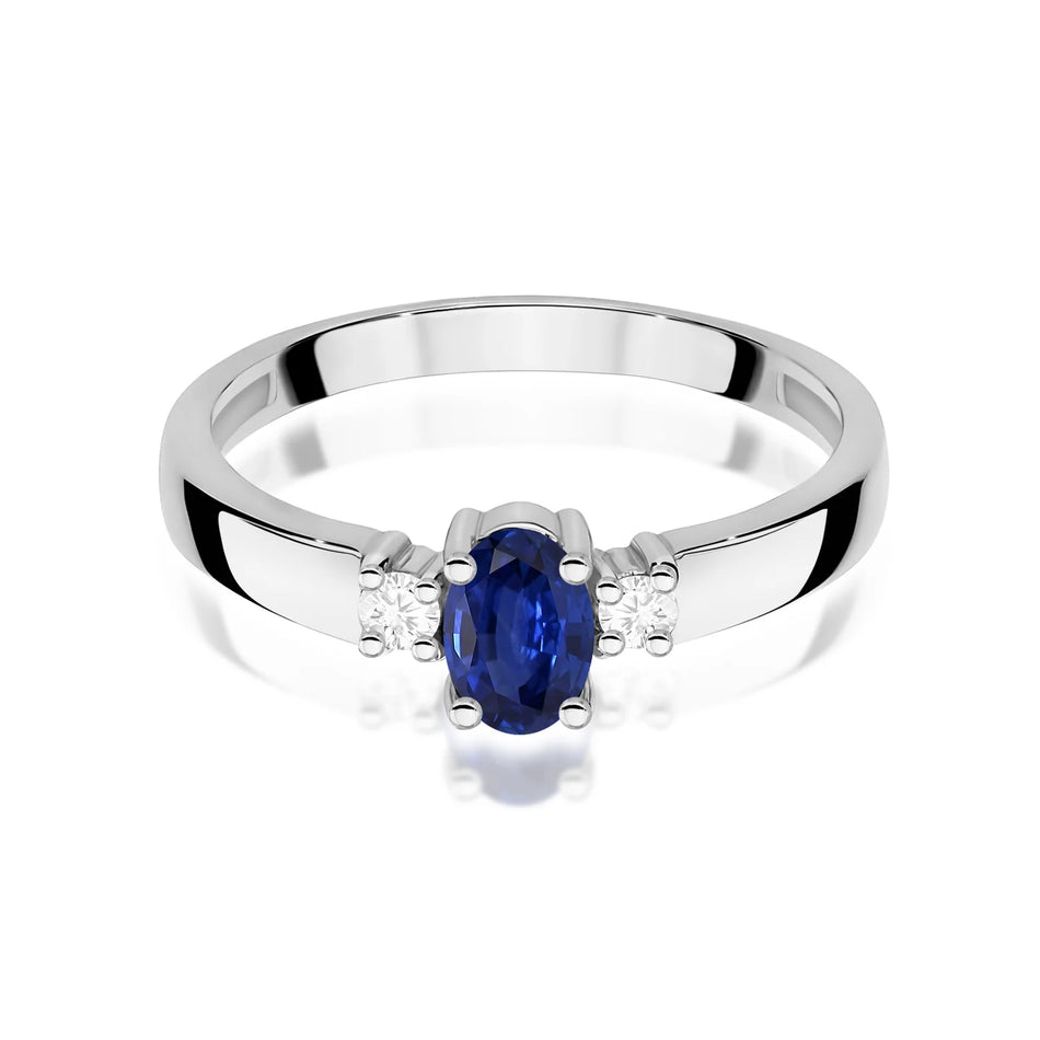 Prsten z bílého zlata se safírem 0,70 ct a diamanty 0,08 ct