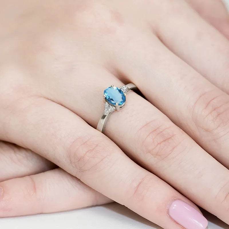 gold-ring-with-0-90ct-topaz-and-0-052ct-diamonds-w0308-tob-01