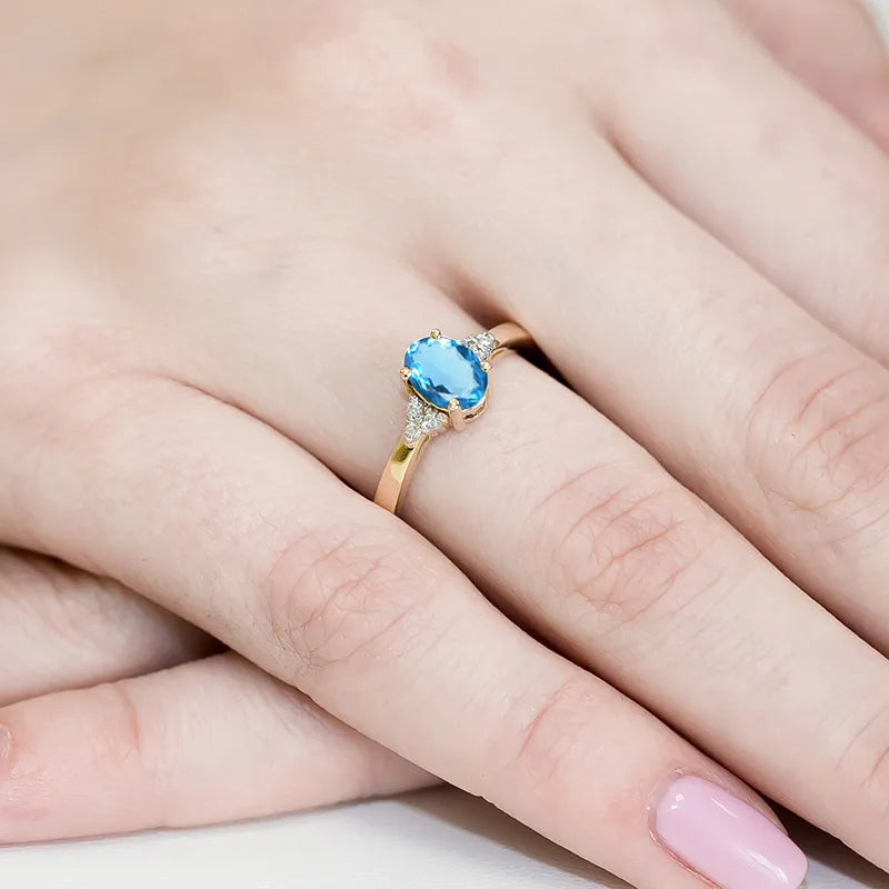 zlatý prsten s topazem 0,90 ct a diamanty 0,052 ct w0308-tob-01