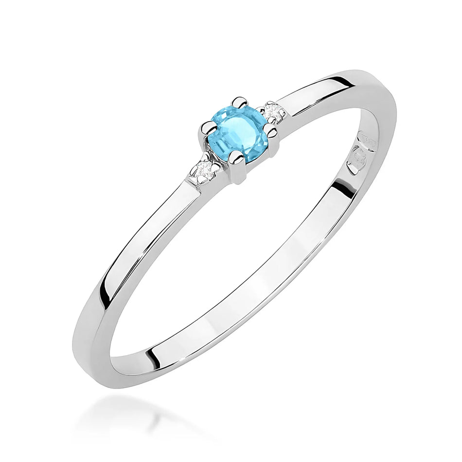 Prsten z bílého zlata s 0,15 ct švýcarským modrým topazem a 0,01 ct diamanty