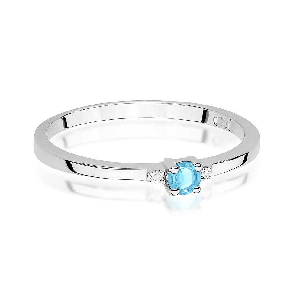 Prsten z bílého zlata s 0,15 ct švýcarským modrým topazem a 0,01 ct diamanty