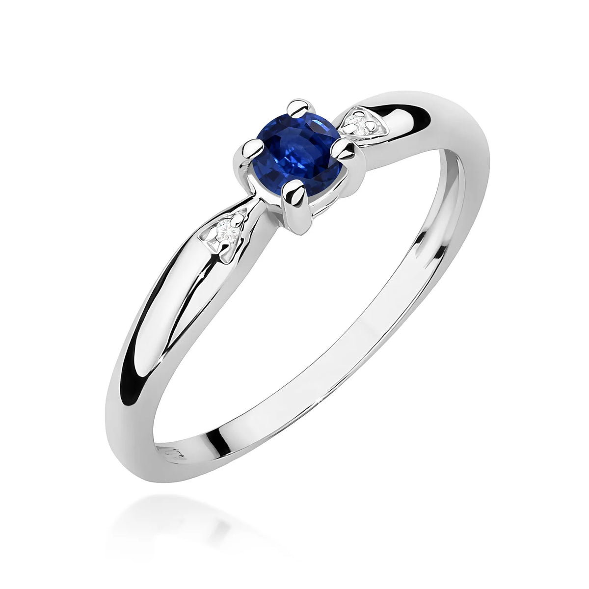 Prsten z bílého zlata s 0,15 ct safírem a 0,01 ct diamanty
