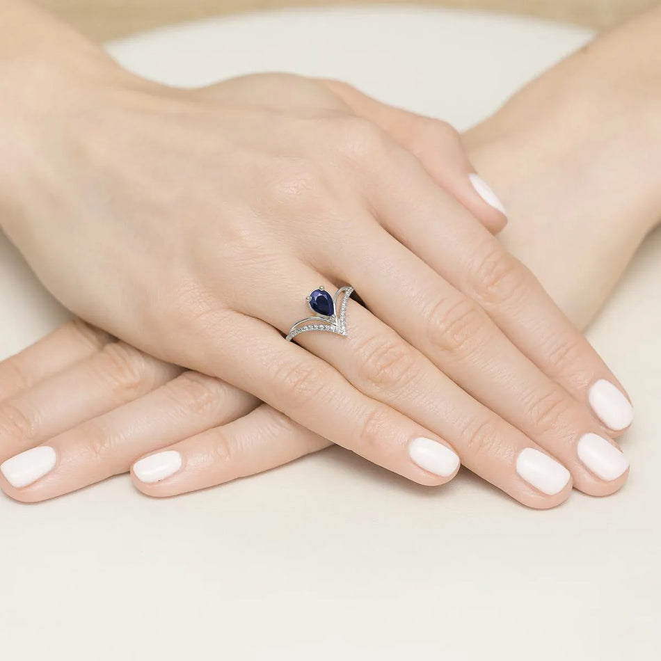 zlatý prsten s 0,60ct safírem a 0,125ct diamanty w0487-sab-01