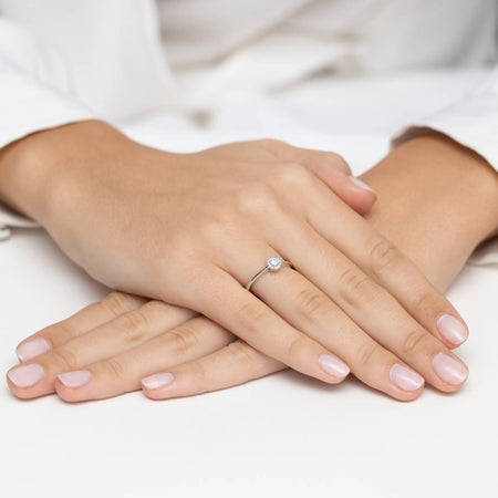 gold-ring-with-0-10ct-diamond-and-0-04ct-sideline-diamonds-w0560-diw-01