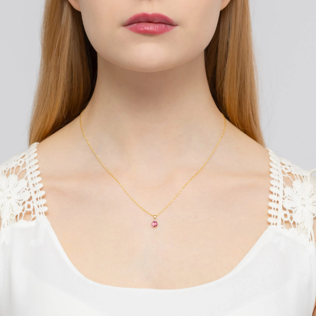 zlatý přívěsek s 0,60ct růžovým topazem a 0,015ct diamanty z0076-top-01