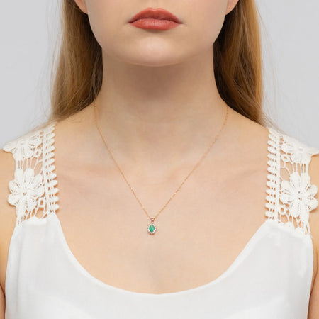 gold-pendant-with-0-40ct-emerald-and-0-12ct-diamonds-z0182-emg-01