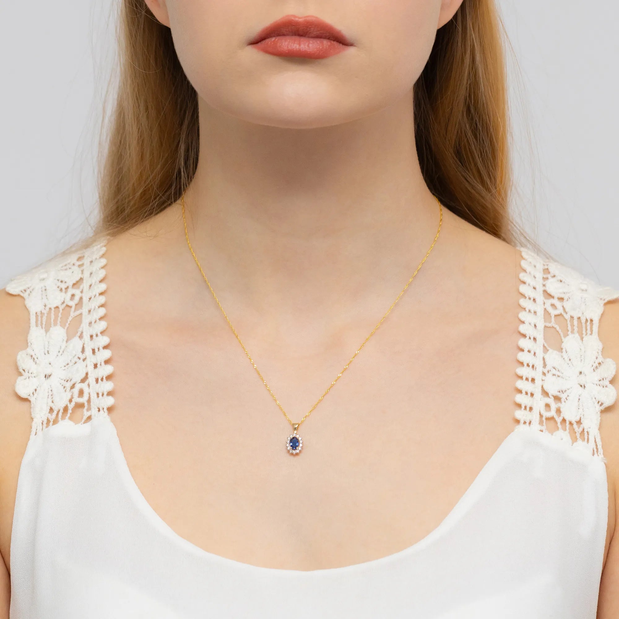 gold-pendant-with-0-70ct-sapphire-and-0-12ct-diamonds-z0182-sab-01