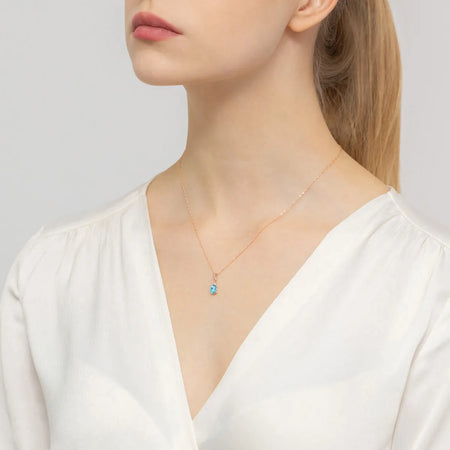 gold-pendant-with-0-90ct-topaz-and-0-026ct-diamonds-z0308-tob-01