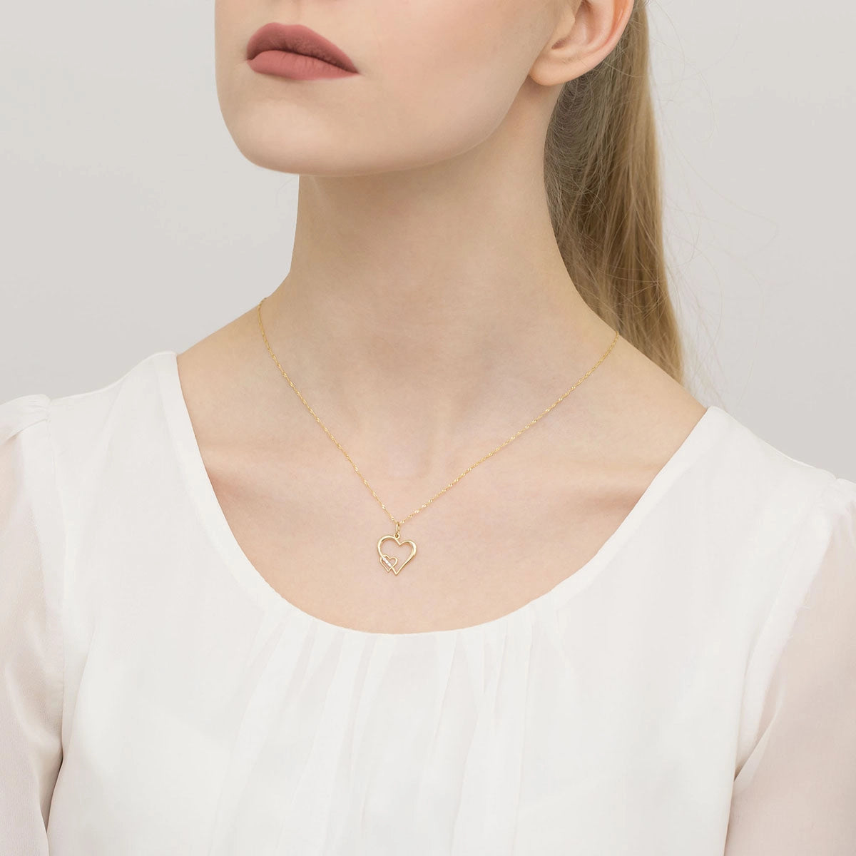 zlatý přívěsek se srdcem ze zirkonie z068-333-c