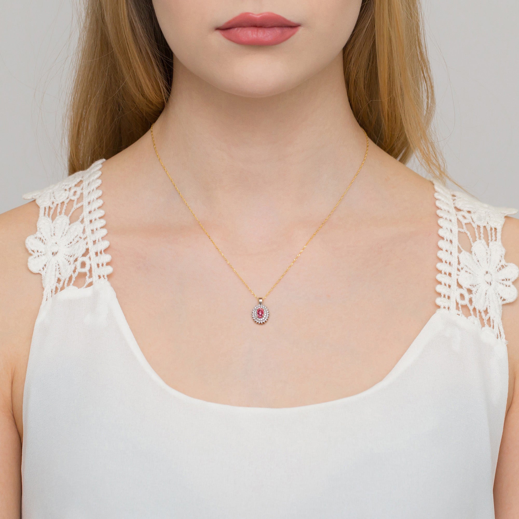 Pendant made of the 14K (585) gold. Our selection includes chains, pendants, necklaces. oval cut pink topaz 0.50ct and 39 diamonds 0.19ct. A unique gift for her