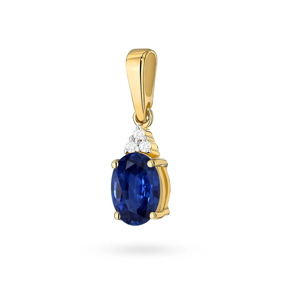 Pendant made of the 14K (585) gold. Our offer includes chains, pendants, necklaces. Central oval cut sapphire 0.90ct and 3 diamonds 0.026ct. Perfect unique gift
