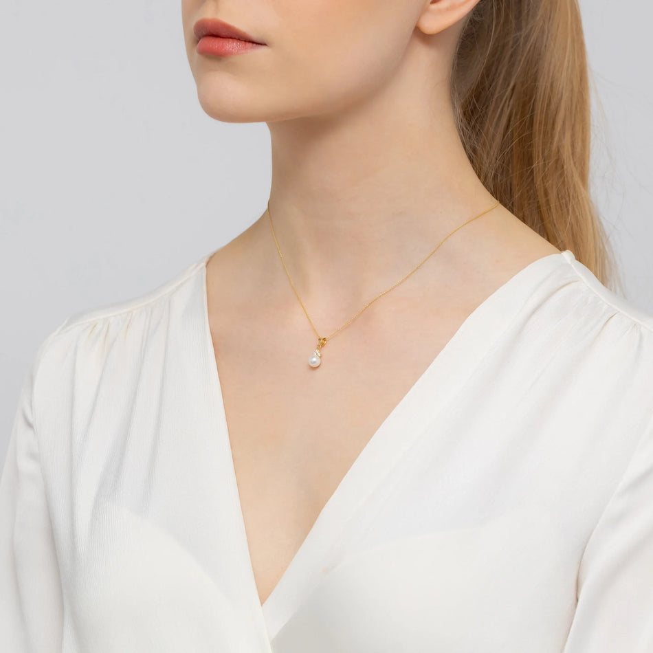 Gold 14K(585) pendant with pearl and 3x zirconias in vintage style. Order a gift for mother, girlfriend or fiancee.