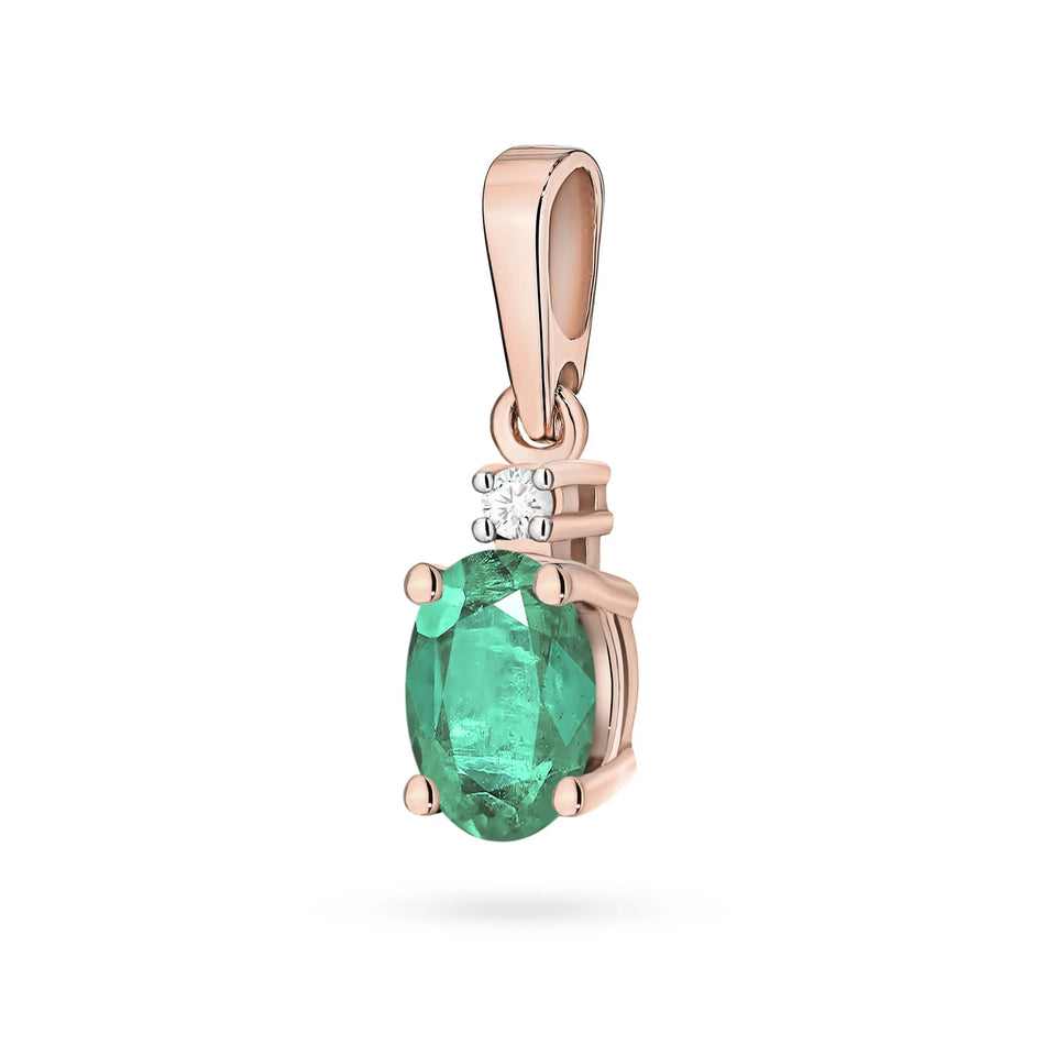 Rose Gold pendant with oval emerald and additional diamonds.