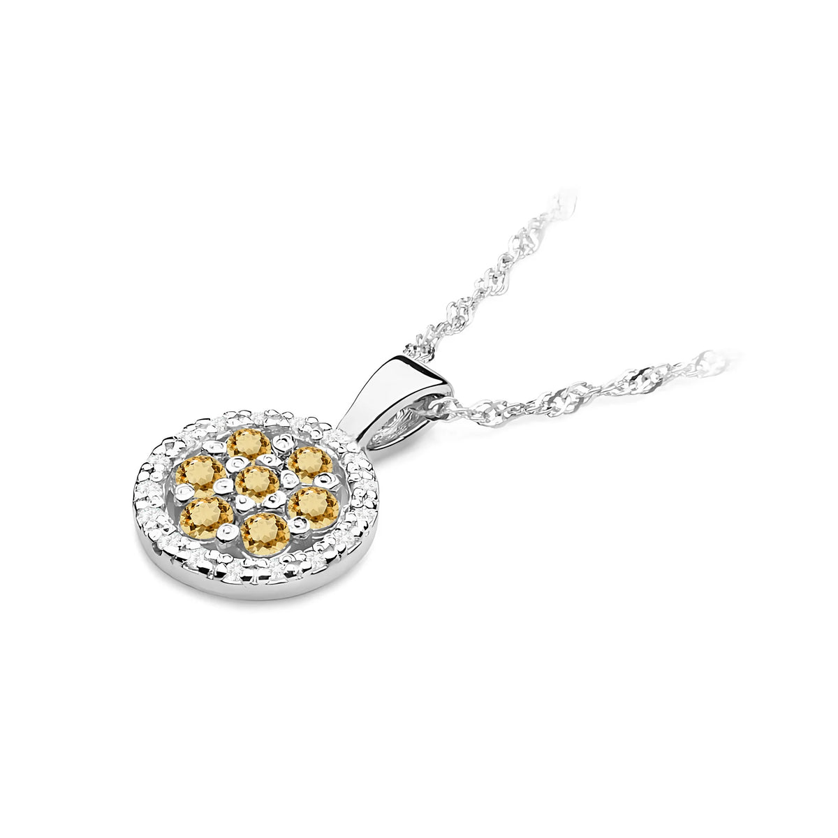 Přívěsek z bílého zlata se středovým bronzovým diamantem a dalšími bílými diamanty.