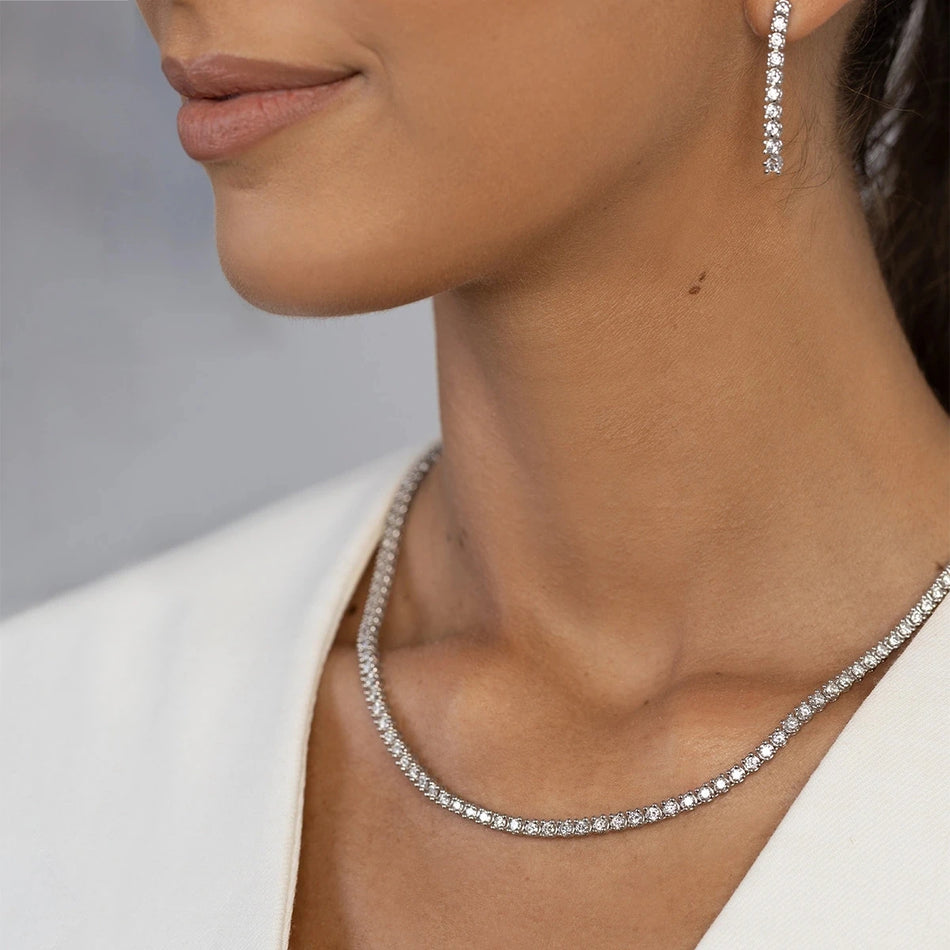 This 14-carat gold necklace with 115 0.06ct diamonds embodies timeless beauty . Perfect for a gift.